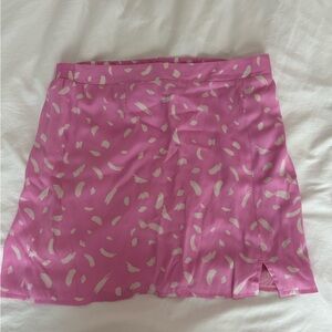 Pink mini skirt (s). Silk like fabric.